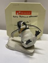 A porcelain figure of a penguin Whoops by Franklin mint