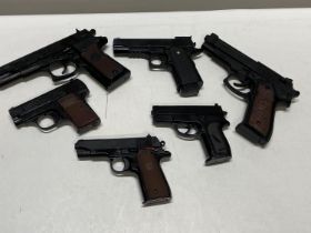 A job lot of replica plastic pistols