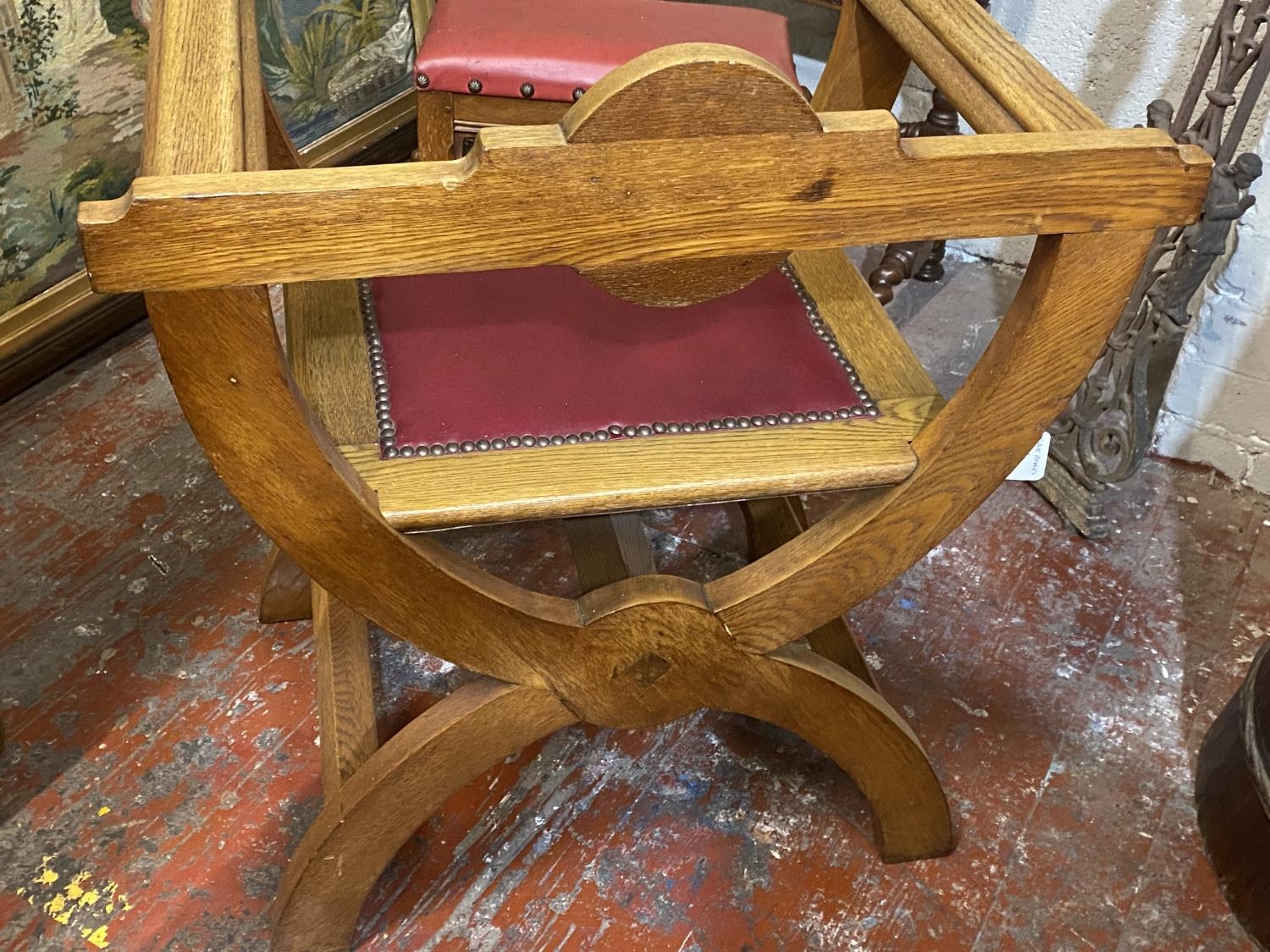 A antique X framed oak bishops chair with red leather insert, shipping unavailable - Image 4 of 4