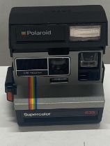 A vintage polaroid 635 super colour camera