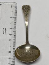 A Scottish hallmarked straining spoon