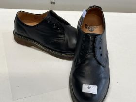 A pair of Dr Marten shoes size 11