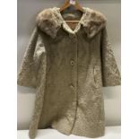 A vintage ladies faux fur coat (no size)