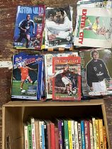 A job lot of vintage football annuals and assorted football programmes and etc. Shipping unavailable