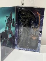 A boxed Neca Aliens figure