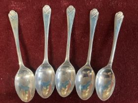 Five hallmarked silver golf themed tea spoons 70g