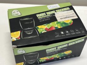 A boxed Fruit Mask Machine (untested)