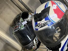 Two crash helmets (worn)