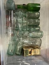 A job lot of vintage glass bottles, shipping unavailable