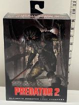 A boxed Neca Predator 2 figure