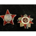 Two Soviet Russian military medals, a Order of the Red Star and a Order of the Great Patriotic War