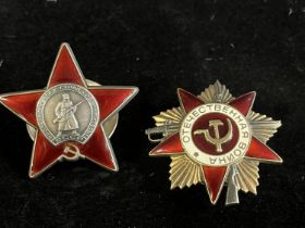 Two Soviet Russian military medals, a Order of the Red Star and a Order of the Great Patriotic War