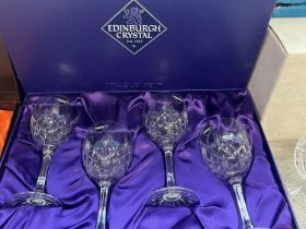 A box set of four Edinburgh lead crystal wine glasses