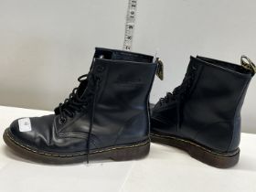 A pair of Dr Marten boots 43