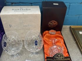 A boxed pair of Royal Doulton brandy crystal glasses and a Webb cut glass crystal small decanter