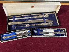 Three boxed pieces of hallmarked silver handled cutlery