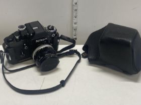 A Nikon F2 35mm camera F27245591 with a Nikkor-0 auto 1:2 F 35mm lens 833196