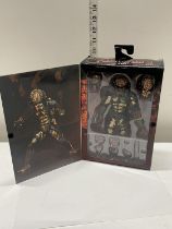 A boxed Neca Predator 2 figure