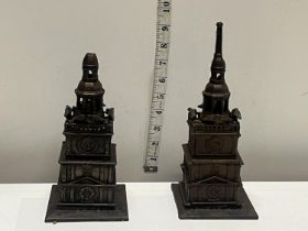 Two antique cast iron Tower Bank money boxes (one with damage)