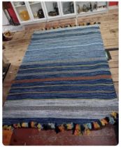 An Oriental weavers Kelin striped blue rug 160x230cm shipping unavailable