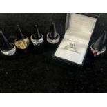 Six assorted stamped 925 dress rings