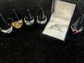 Six assorted stamped 925 dress rings