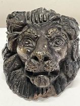 A small antique terracotta head of a lion a/f