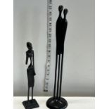 Two unusual metal modernist figures tallest 44cm