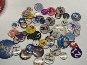 A good selection of assorted vintage badges