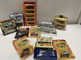 A box of assorted die-cast models