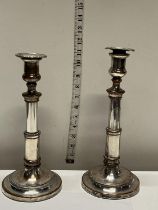 A pair of Edwardian silver on copper adjustable candlesticks