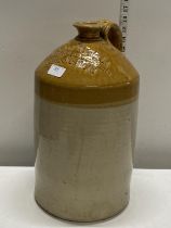 A vintage salt glazed earthenware wine flagon by R and W Wright Macclesfield h40cm, shipping