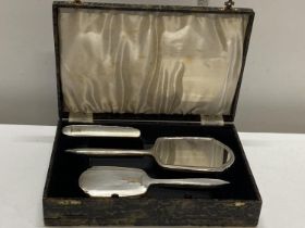 A quality Art Deco period hallmarked silver mounted dressing table set in original box