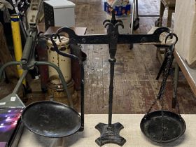 A set of unusual cast iron balance scales