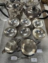 A selection of silver plated ware with a hallmarked silver spoon. No shipping