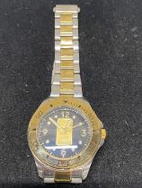 A Swiss Ingot watch with stainless steel strap with a fine 999.9 gold ingot insert on dial