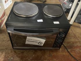 A lightly used mini oven and electric hob, shipping unavailable