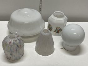 A selection of vintage glass light shades, shipping unavailable