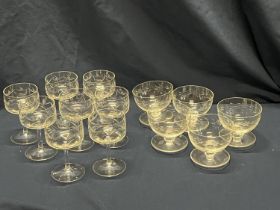 A selection of etched glass dessert bowls and etched cocktail glasses. Shipping unavailable
