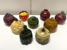 A selection of assorted ceramic preserve pots including Slyvac