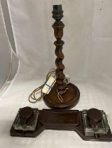 A antique Art Deco period bakelite desk tidy and a treen wooden lamp base