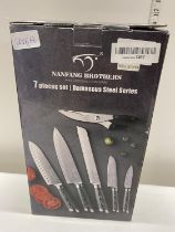 A Nanfang Brothers professional knife set (missing 5" knife however has two 3.5" inch knives)