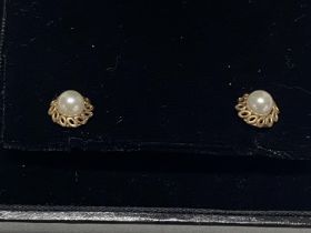 A pair of 9ct gold and pearl earrings