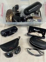 A selection of assorted sunglasses