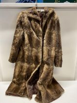 A ladies long fur coat, no size