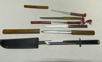 A selection of miniature Japanese swords, letter openers and one dagger with sheath (UK Shipping