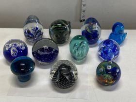 A job lot of assorted paperweights including Caithness