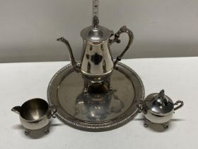 A silver plated tea service and tray