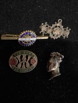 A silver bar brooch and a selection of white metal and enamel badges