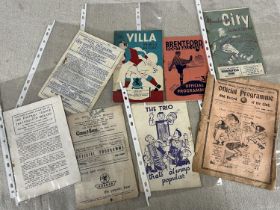 A selection of vintage football programmes including a 1933 Tottenham Hotspur vs Arsenal programme